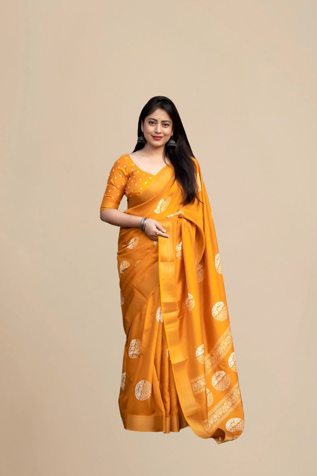 Studio front view of yellow saree showing print and elegant shape
