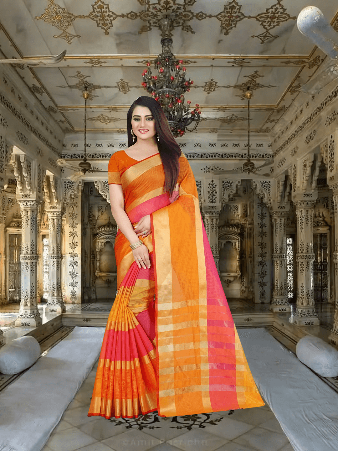 Model basking in golden sunlight, saree glowing in saffron orange with soft drape