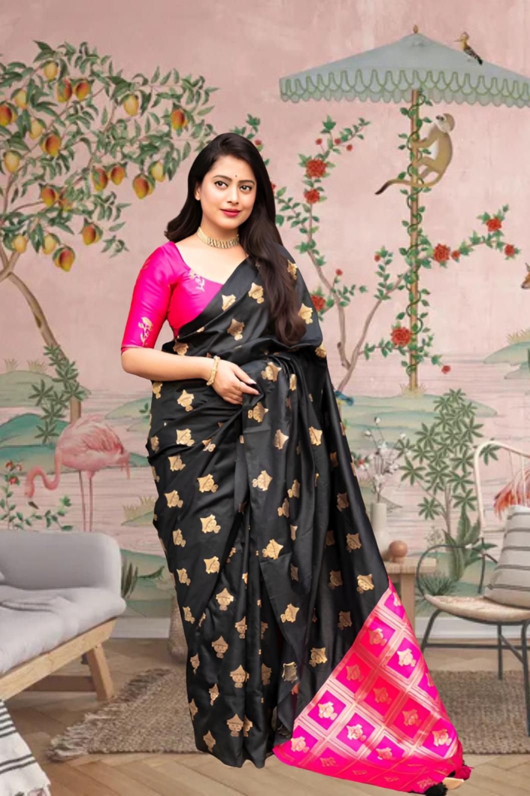 Front view of black silk saree with pink blouse in royal setting