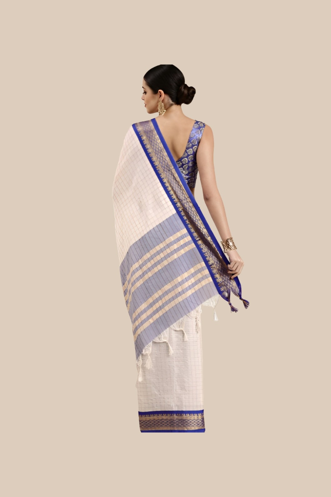 Studio back shot showing pallu flow and checkered depth