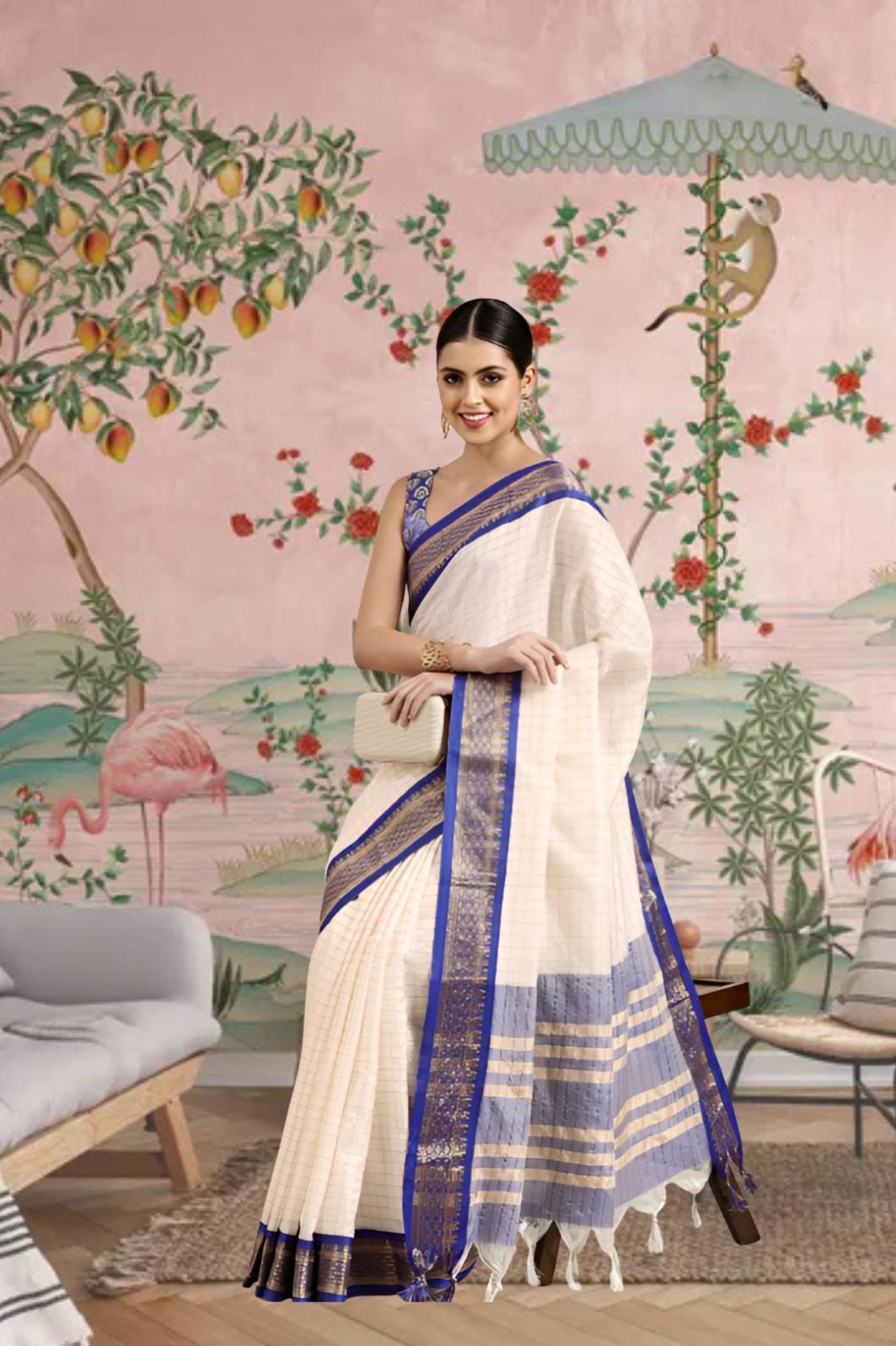 Front view of royal blue checkered saree in regal setting