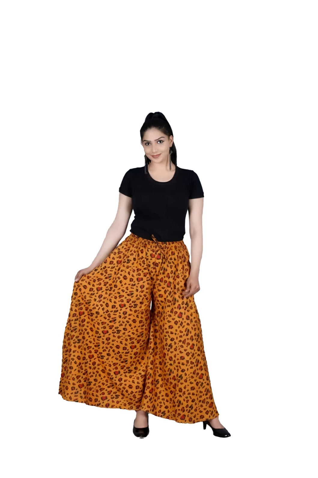 Isolated front view of saffron-orange palazzo pants