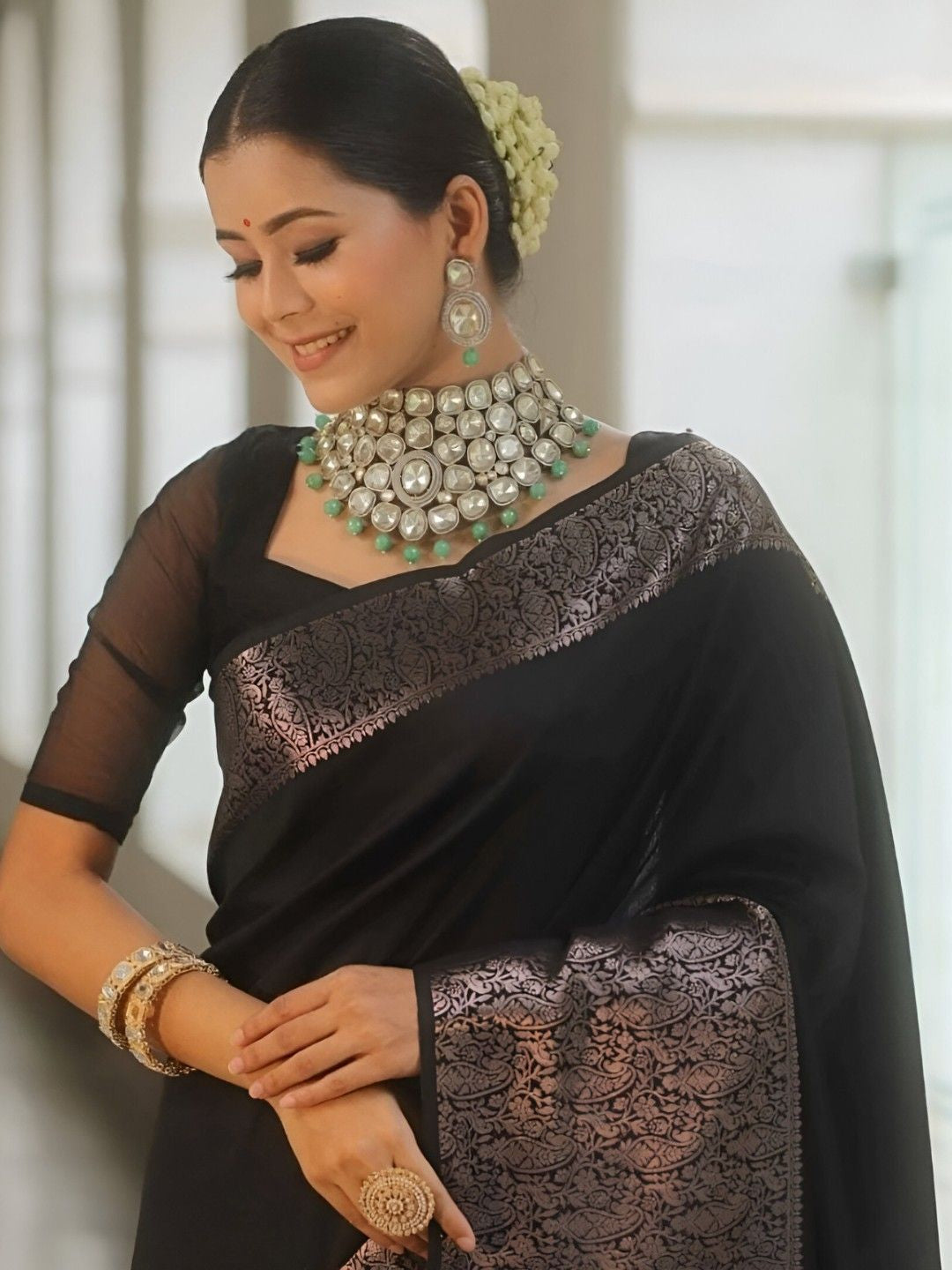 Model standing tall in dramatic drape