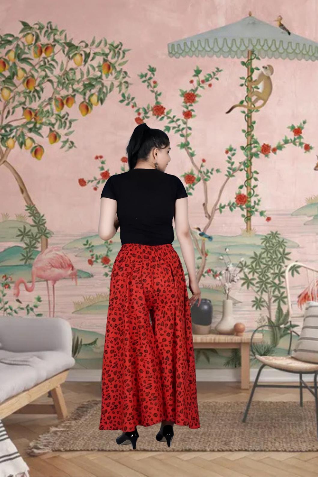 Back view showing rich red hue and flowy silhouette