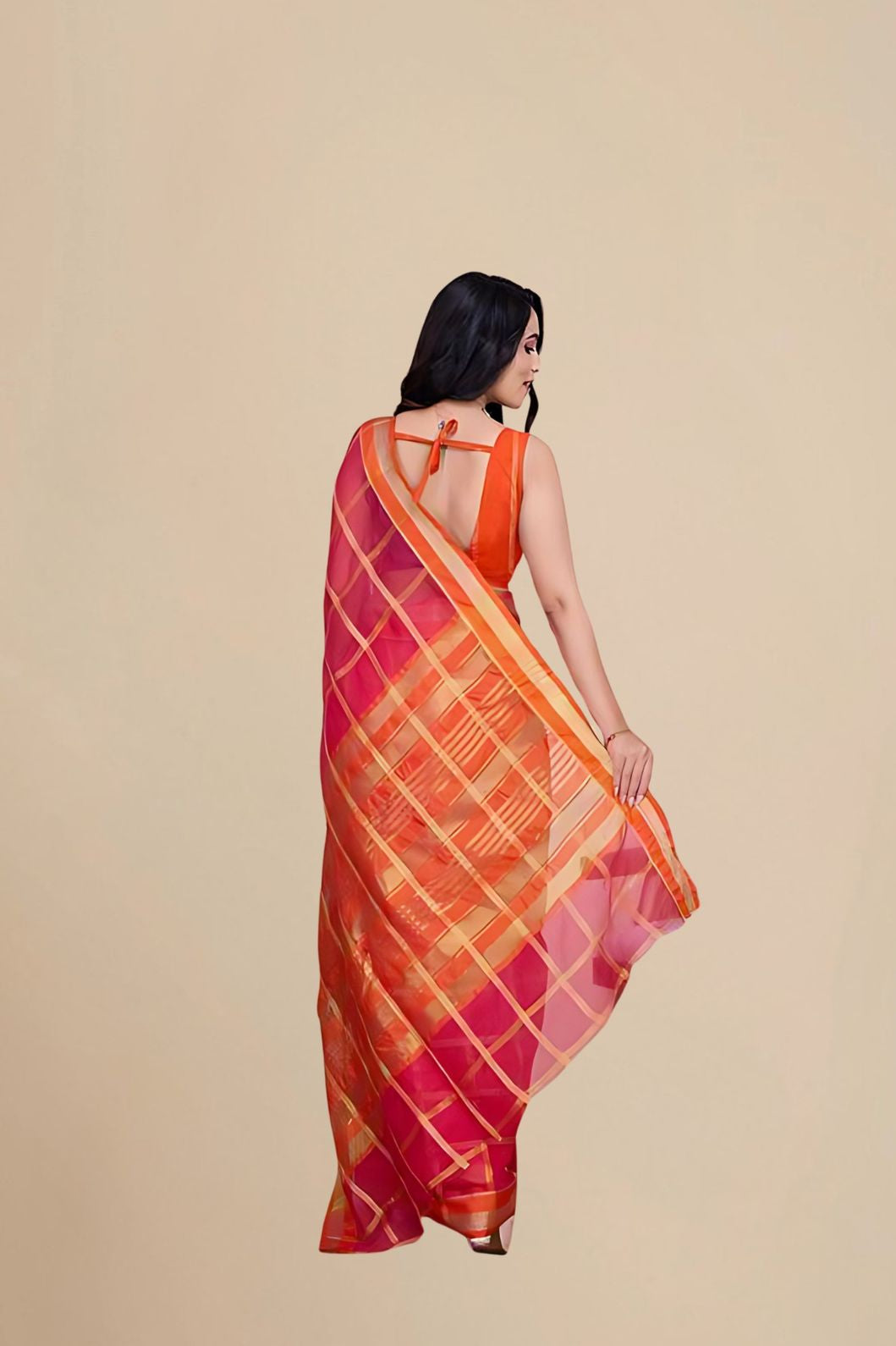Studio rear view showing blouse combination and pallu drape