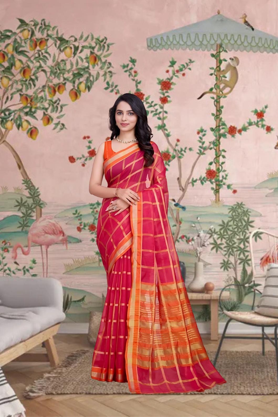 Front view of red checkered saree glowing in palace light