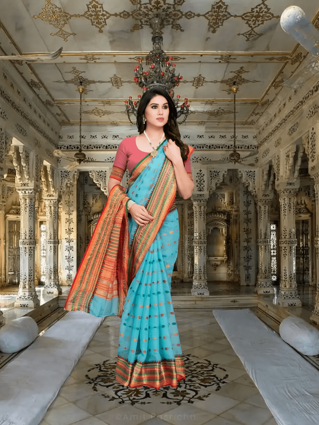 Side view of MeghMalika saree showcasing elegant pallu and dot detailing against lifestyle background.