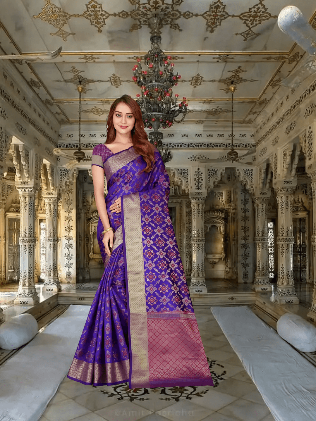 Close-up of floral patterns on purple Kanchivaram silk with zari detailing