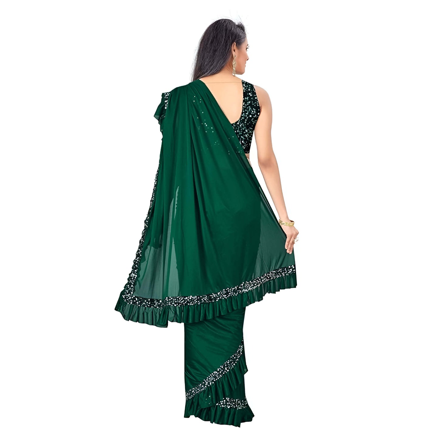 Woman twirling in emerald Lycra saree for Instagram look