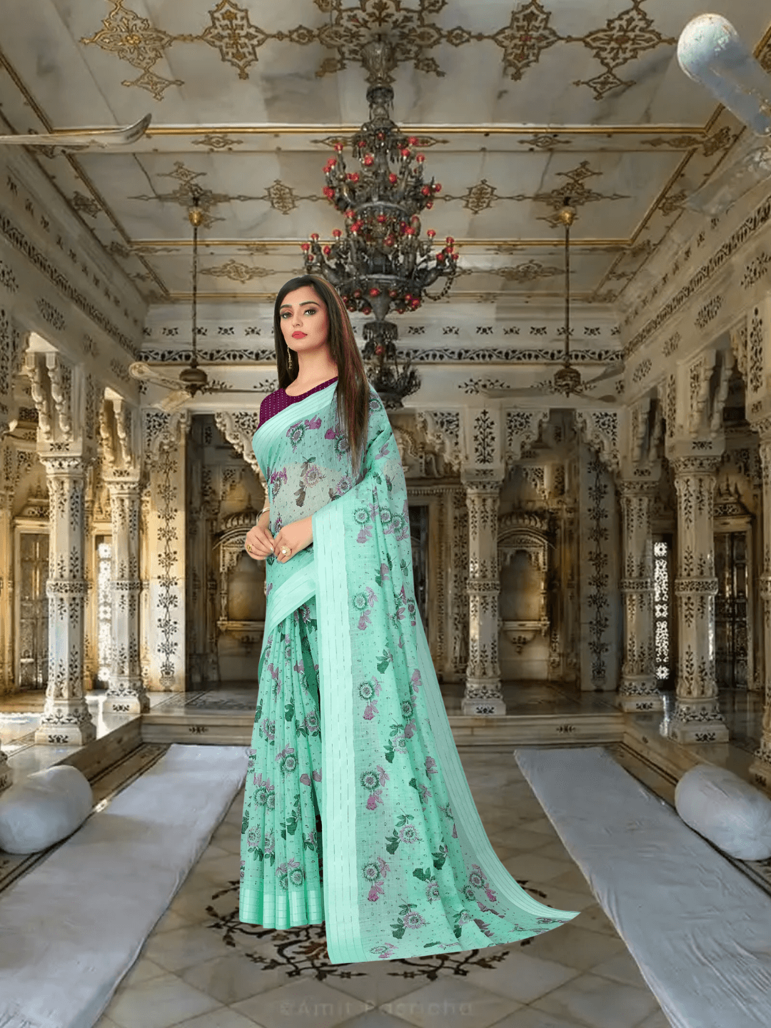 Full pallu view of floral printed cotton saree flowing naturally in palace setting