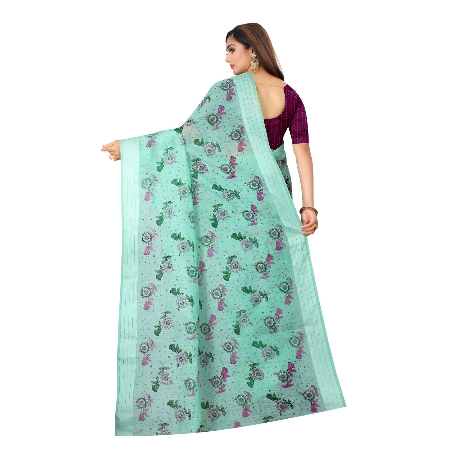 Close view of neatly pleated light green saree highlighting texture and floral design
