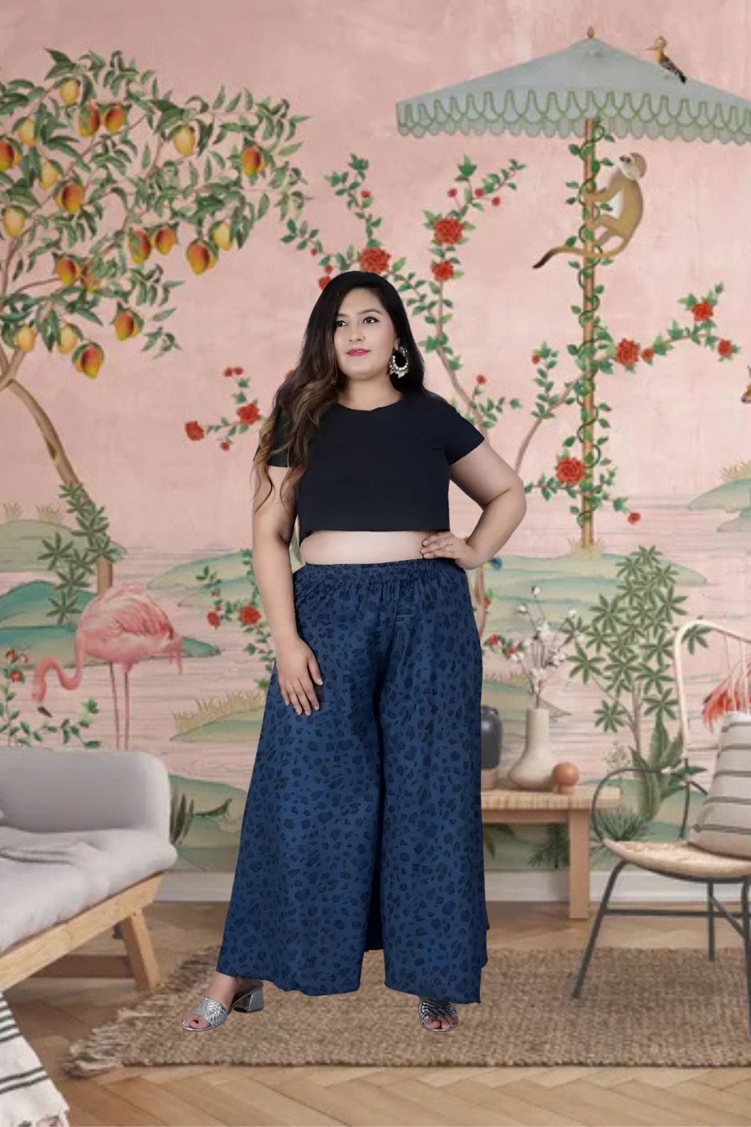 Front view of blue cotton printed palazzo pants in palace interior