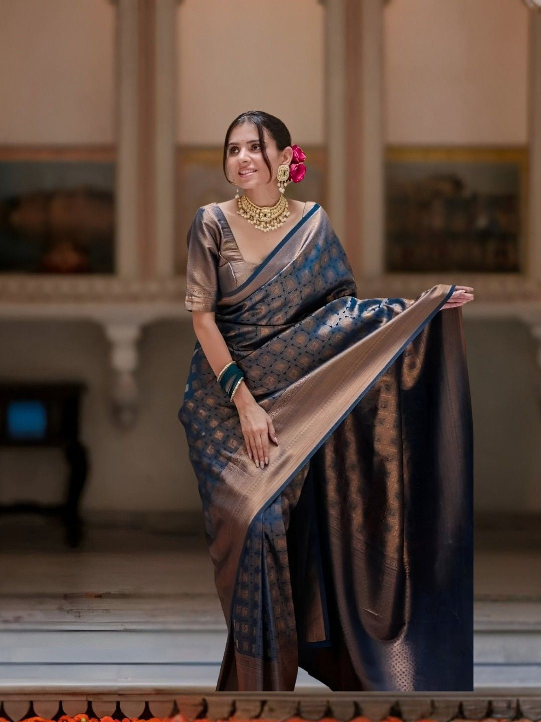 Model in Neelantara saree posing in palace room, front view