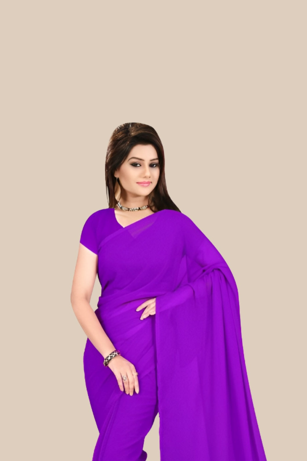 Studio front shot of plain purple georgette saree with blouse