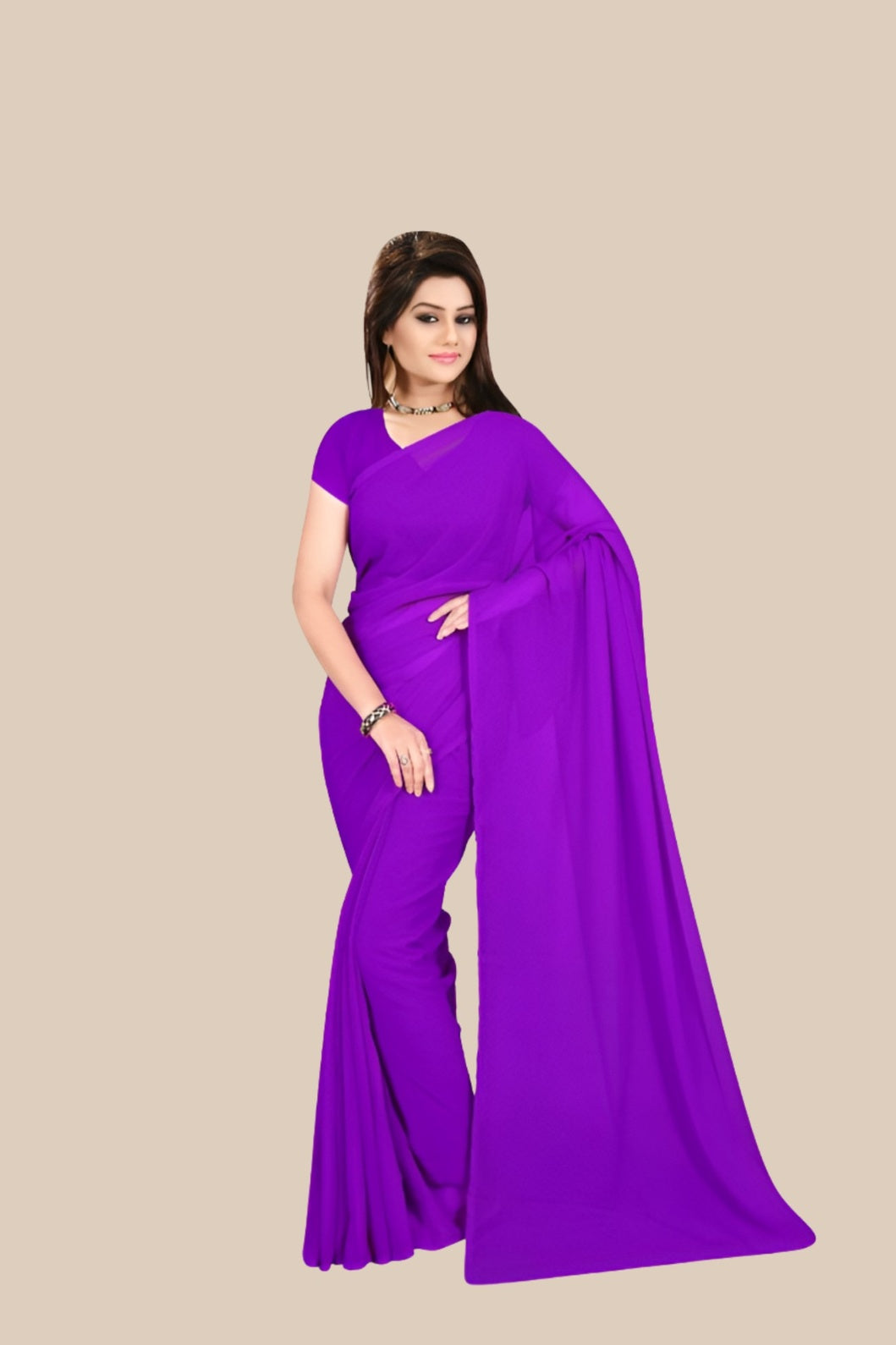 Studio front shot of plain purple georgette saree with blouse