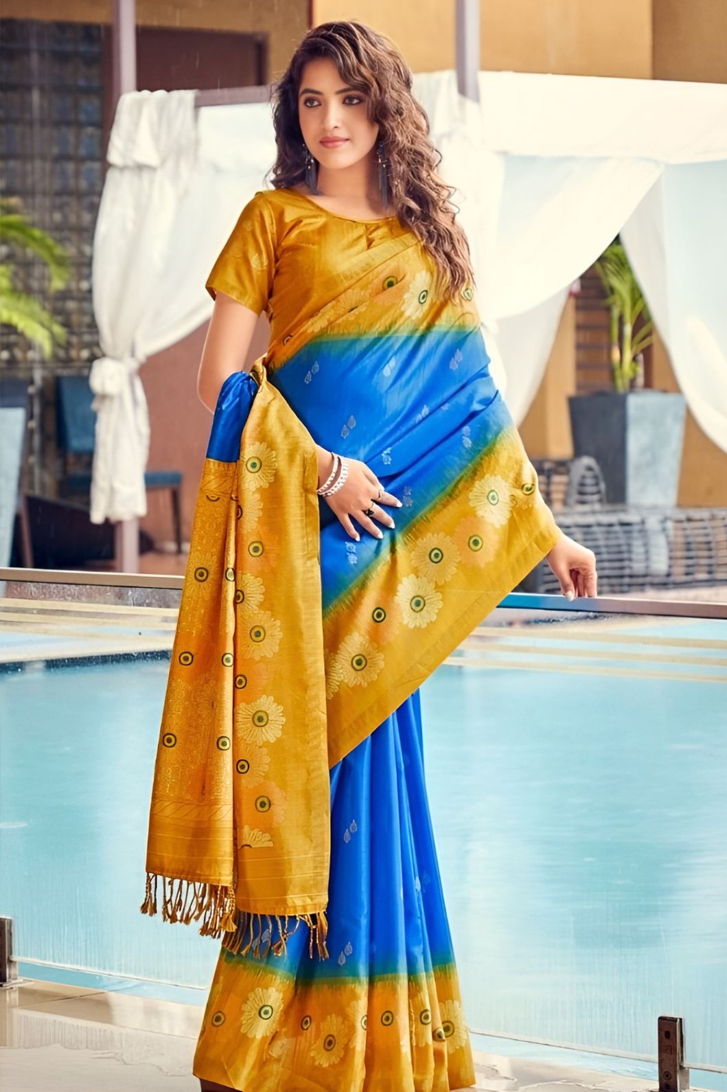 Studio front view showing full saree with color blend and structure