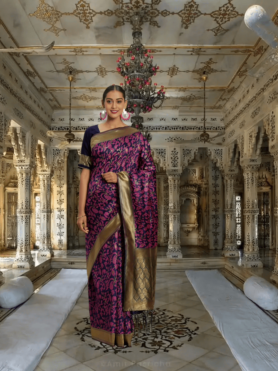 Model in navy and magenta Banarasi silk saree with gold zari in palace room