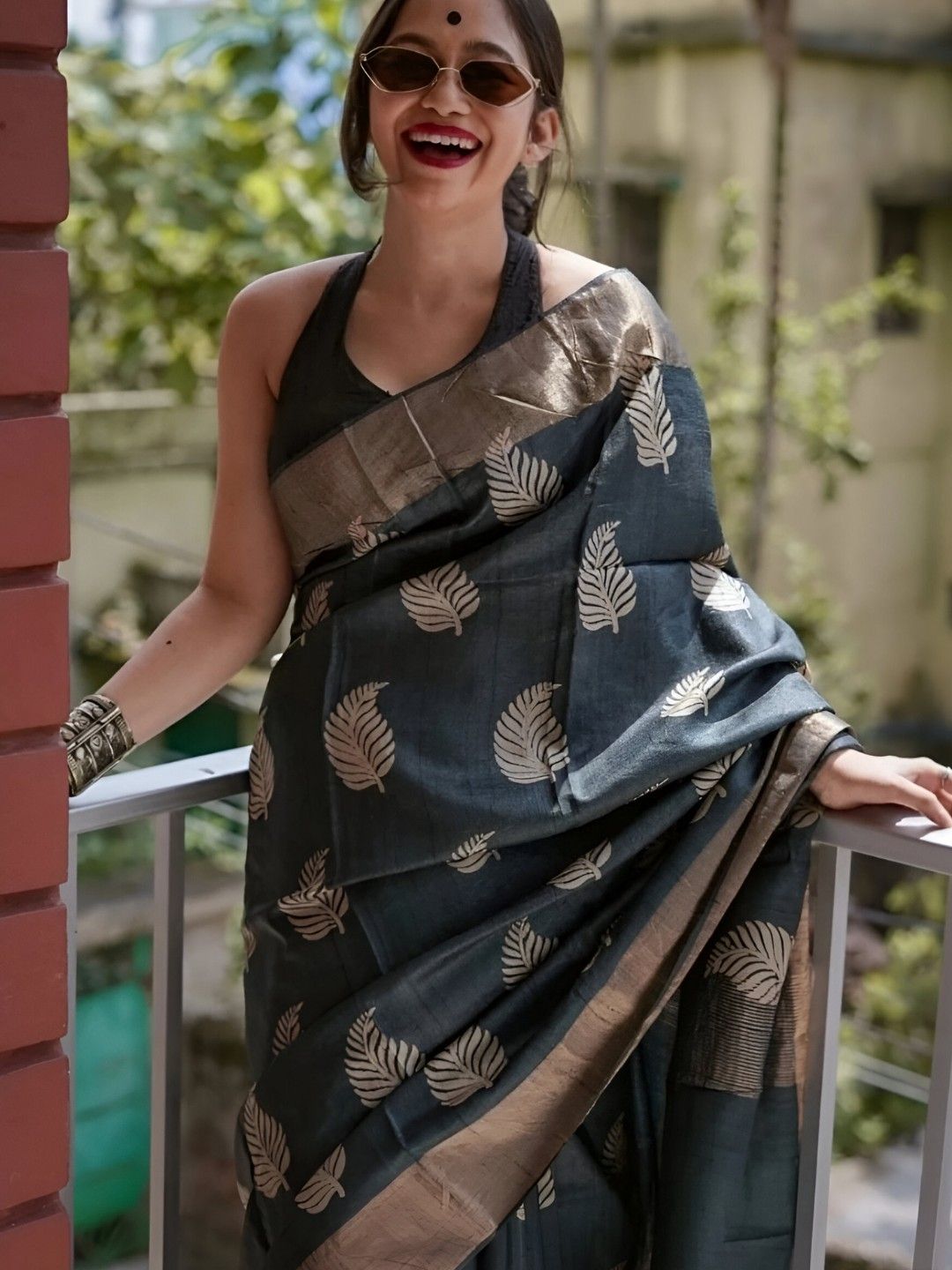 Model stands poised with silk gracefully flowing