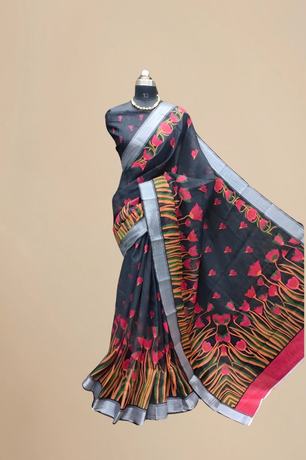 Studio shot of full saree from front for product clarity