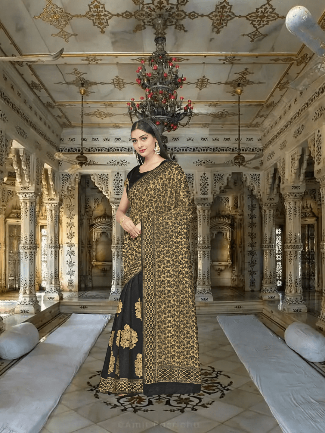 Close-up of abstract golden zari patterns on black silk fabric