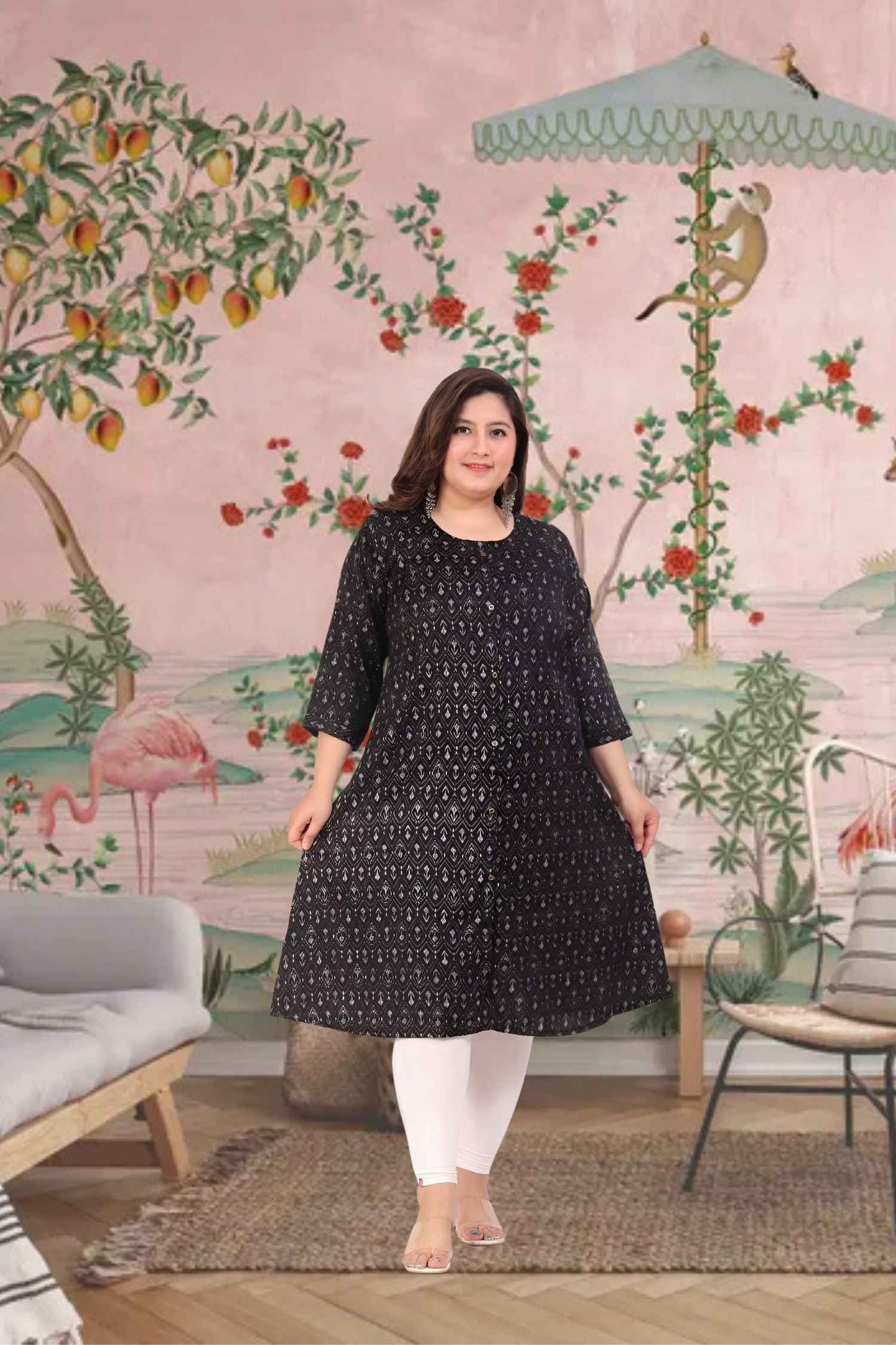 Front view: Black kurti against a soft golden-hour skyline