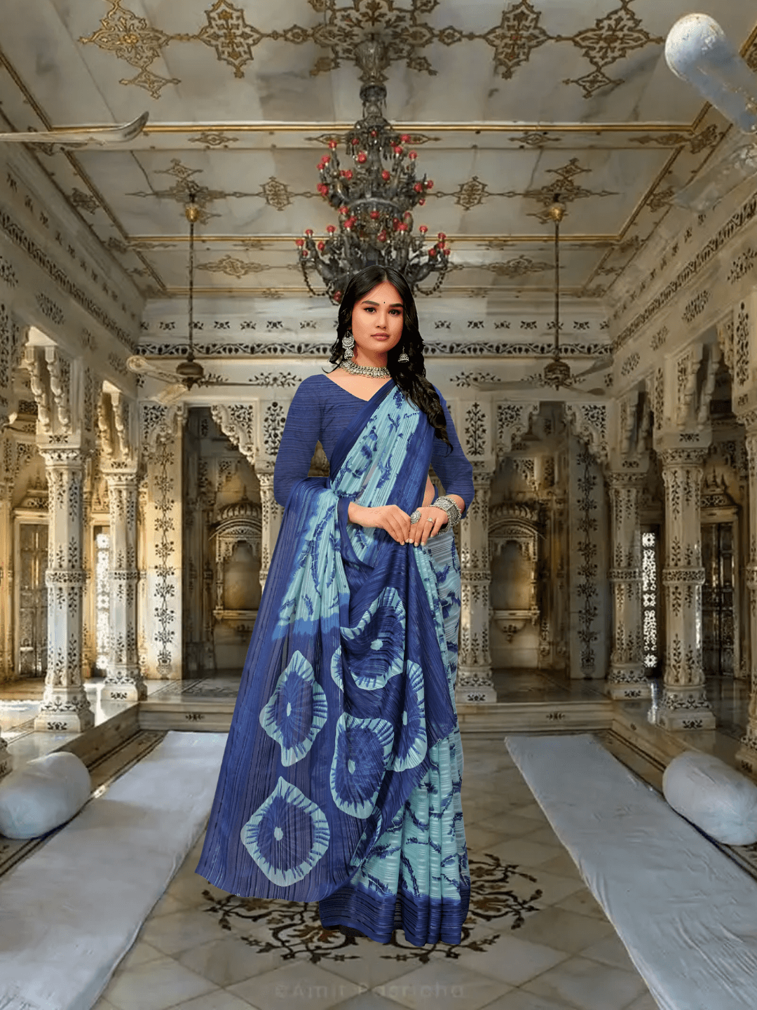 Dark blue & green georgette saree draped