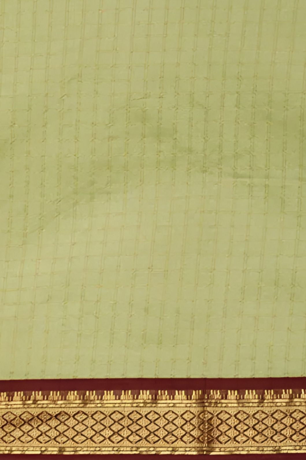 Studio close-up of pallu threads and color texture