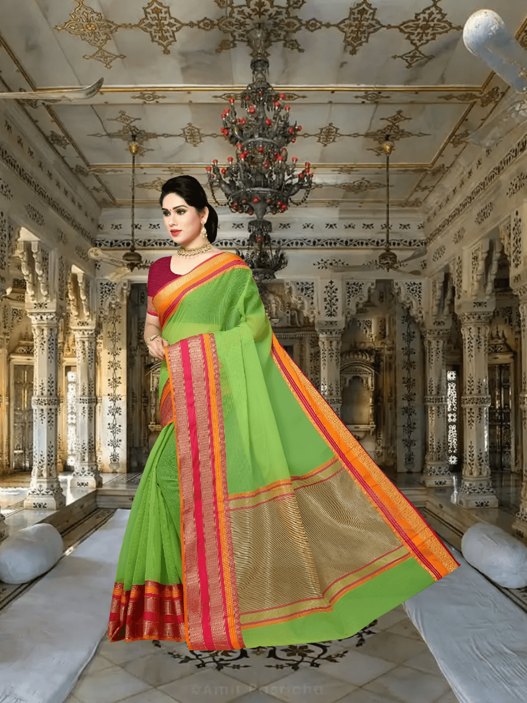 Back angle showing full pallu fall with pink accents glowing in natural light