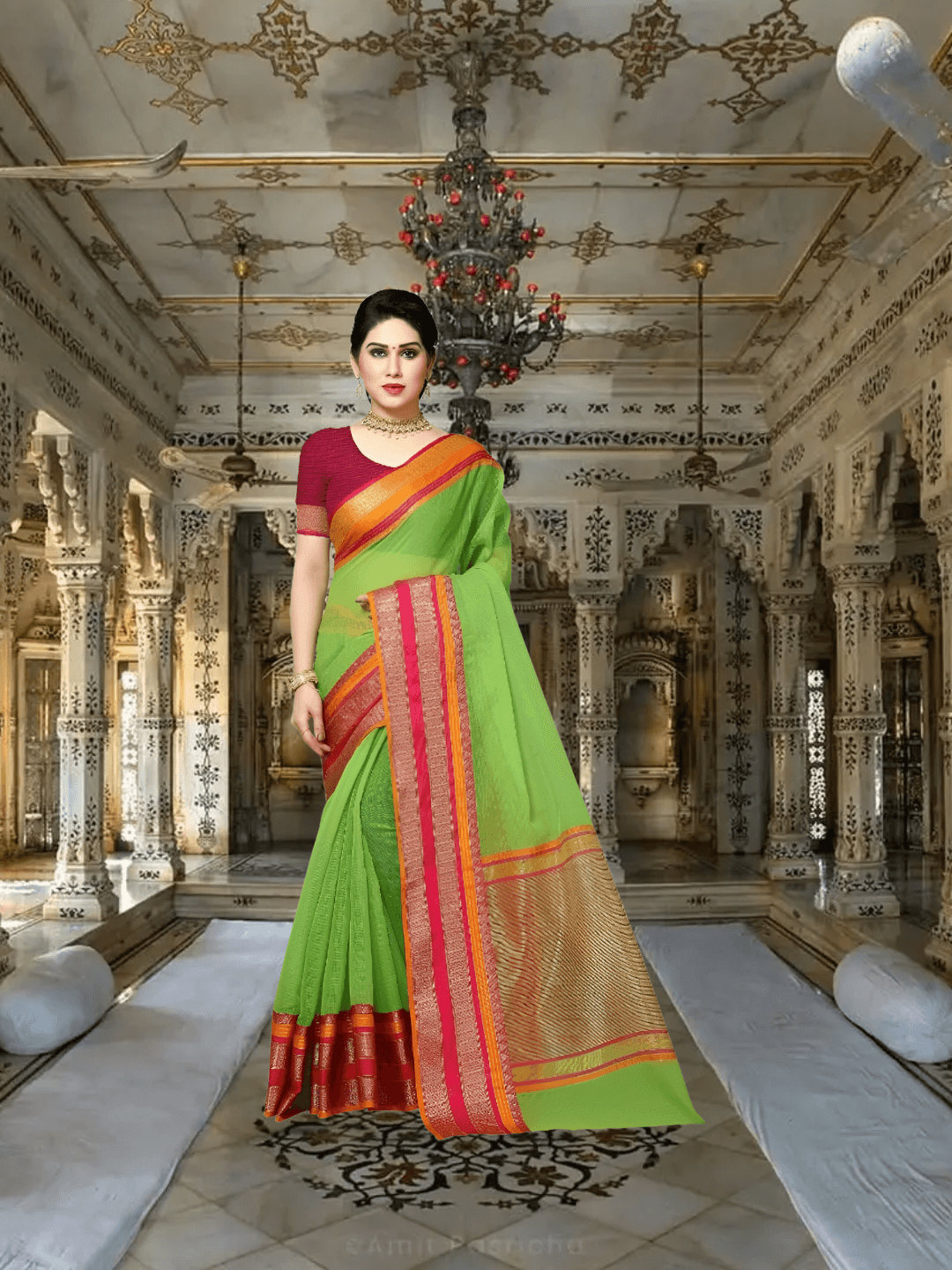 Model walking gracefully through garden, saree catching soft sunlight on green silk