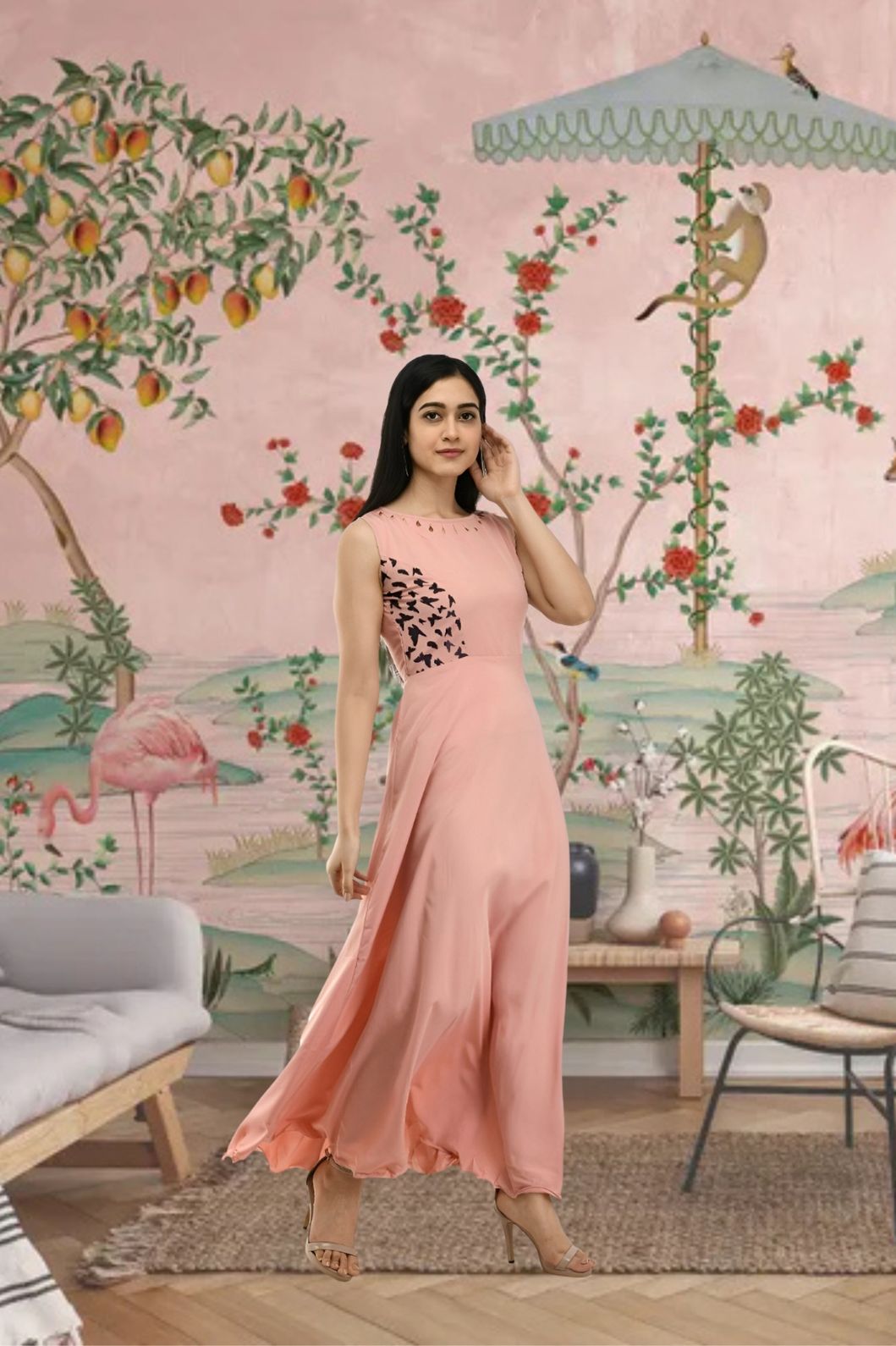 Left side view of sleeveless peach crepe gown for women