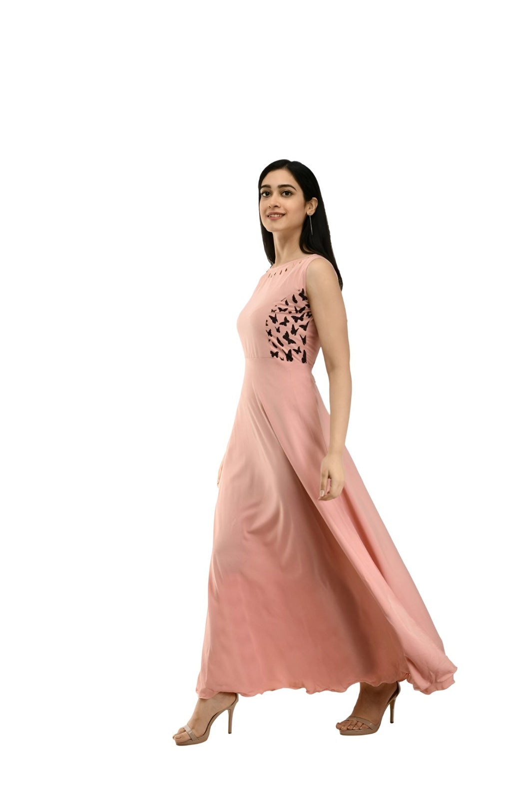Right studio angle of light peach crepe full-length gown