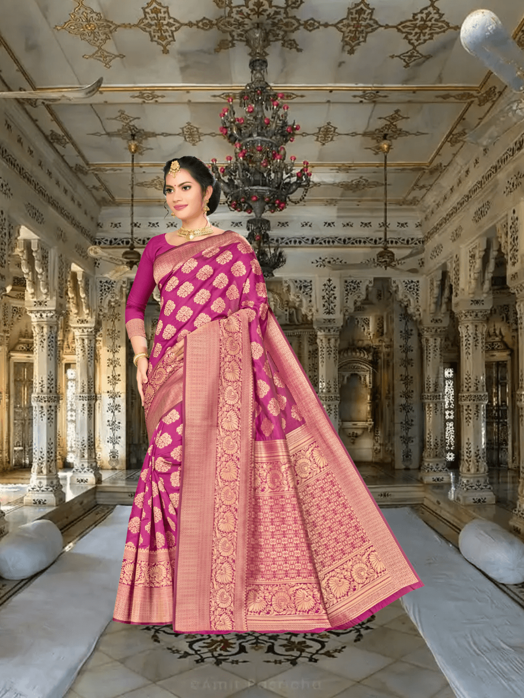 Model wearing wine purple Banarasi silk saree with gold border in palace setting
