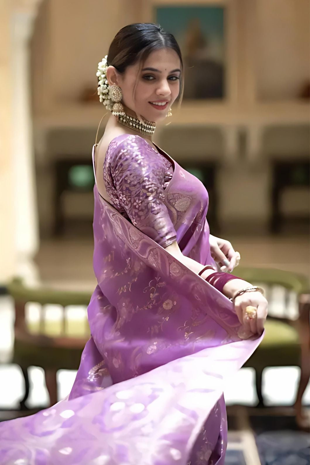 Rear studio shot with pallu captured mid-flow