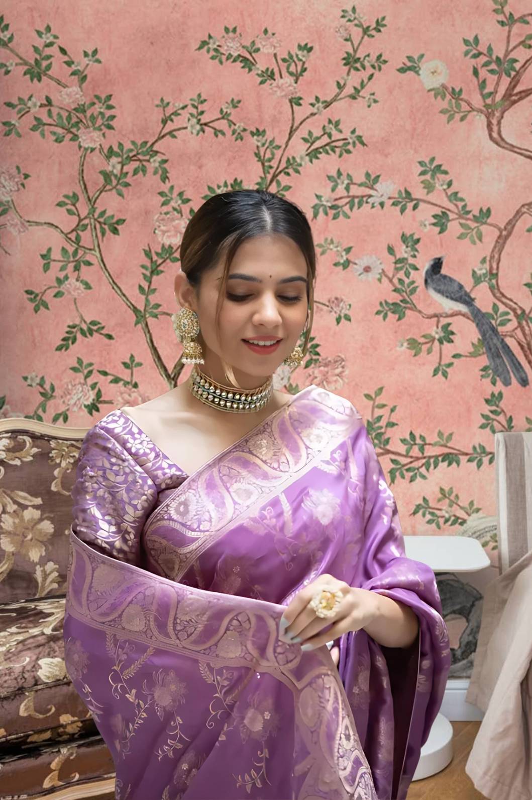 Front view in lavender art silk against royal backdrop