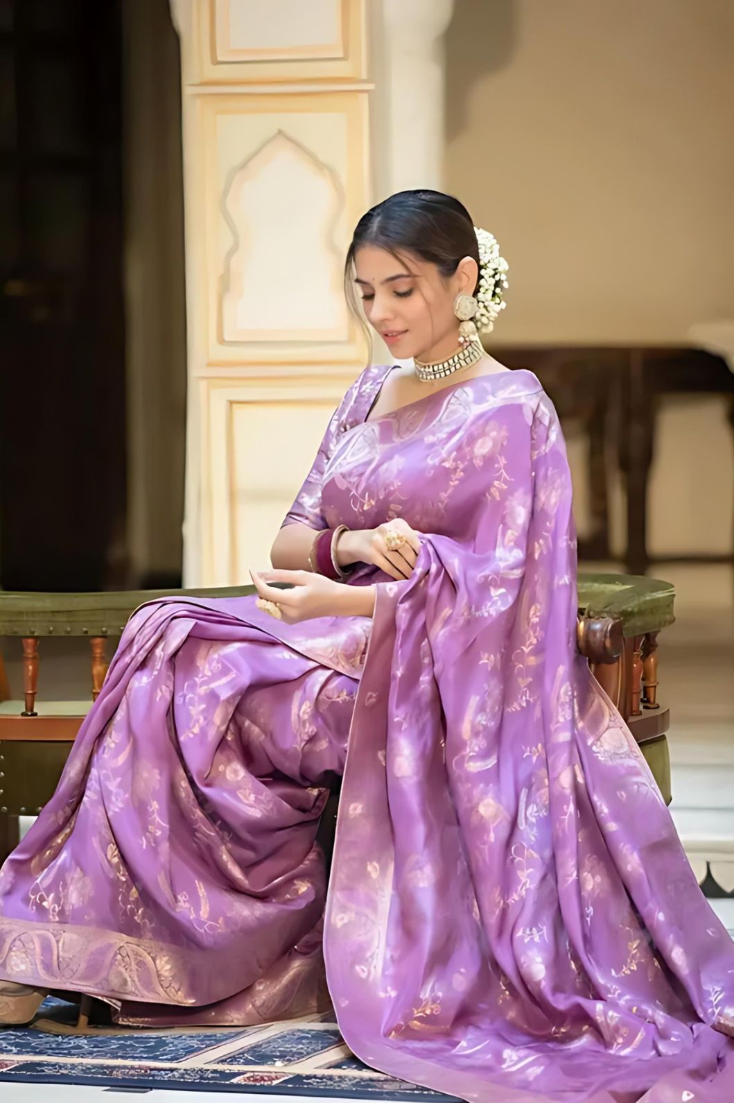 Studio close-up of pallu embellishment in lavender silk