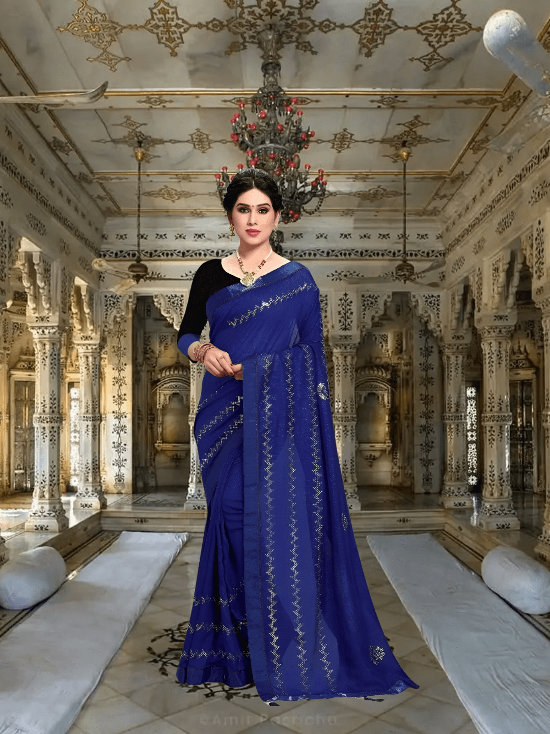 Zoomed-in look at stitched motifs on rich Vichitra silk fabric