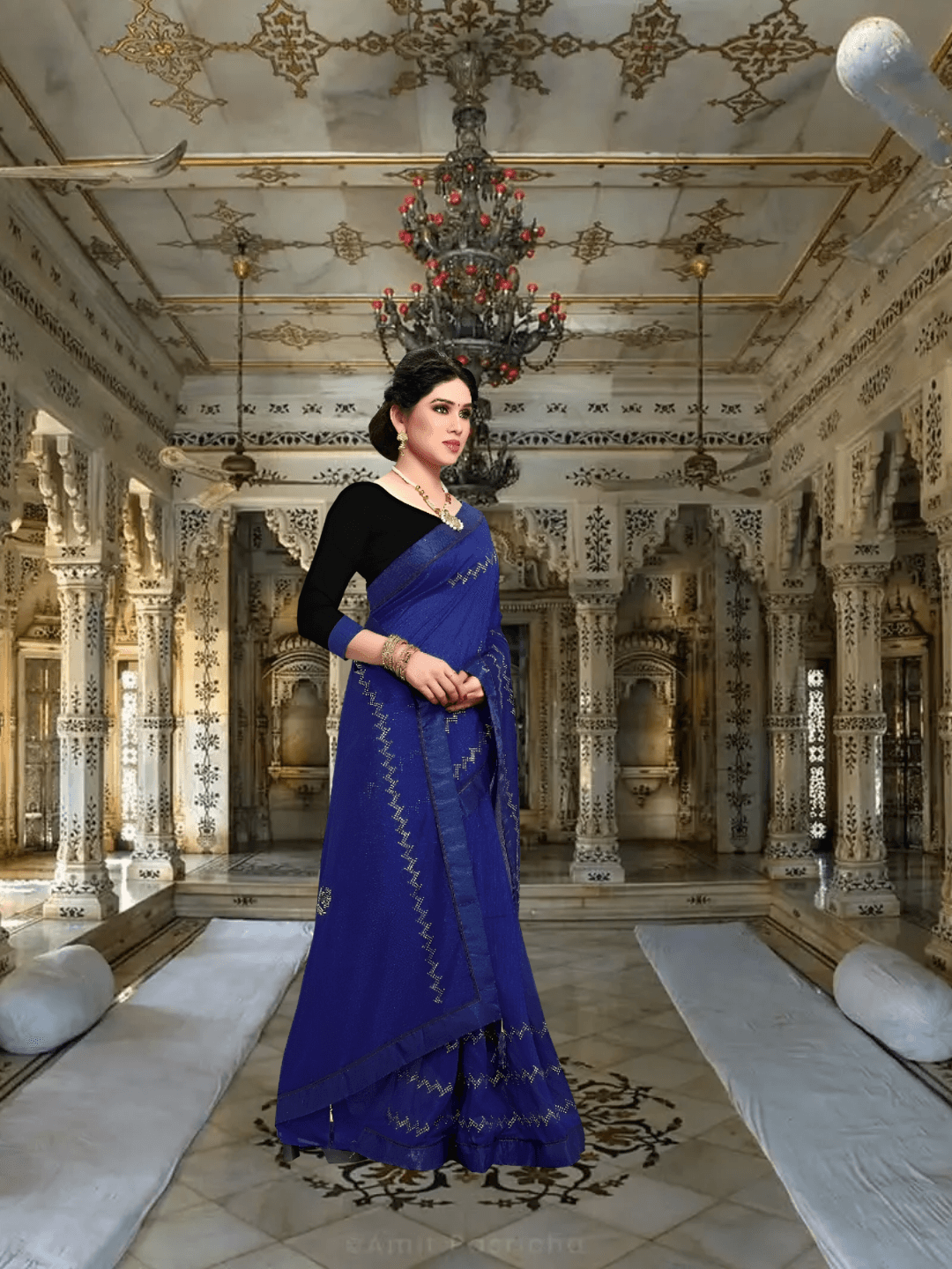 Zoomed-in look at stitched motifs on rich Vichitra silk fabric