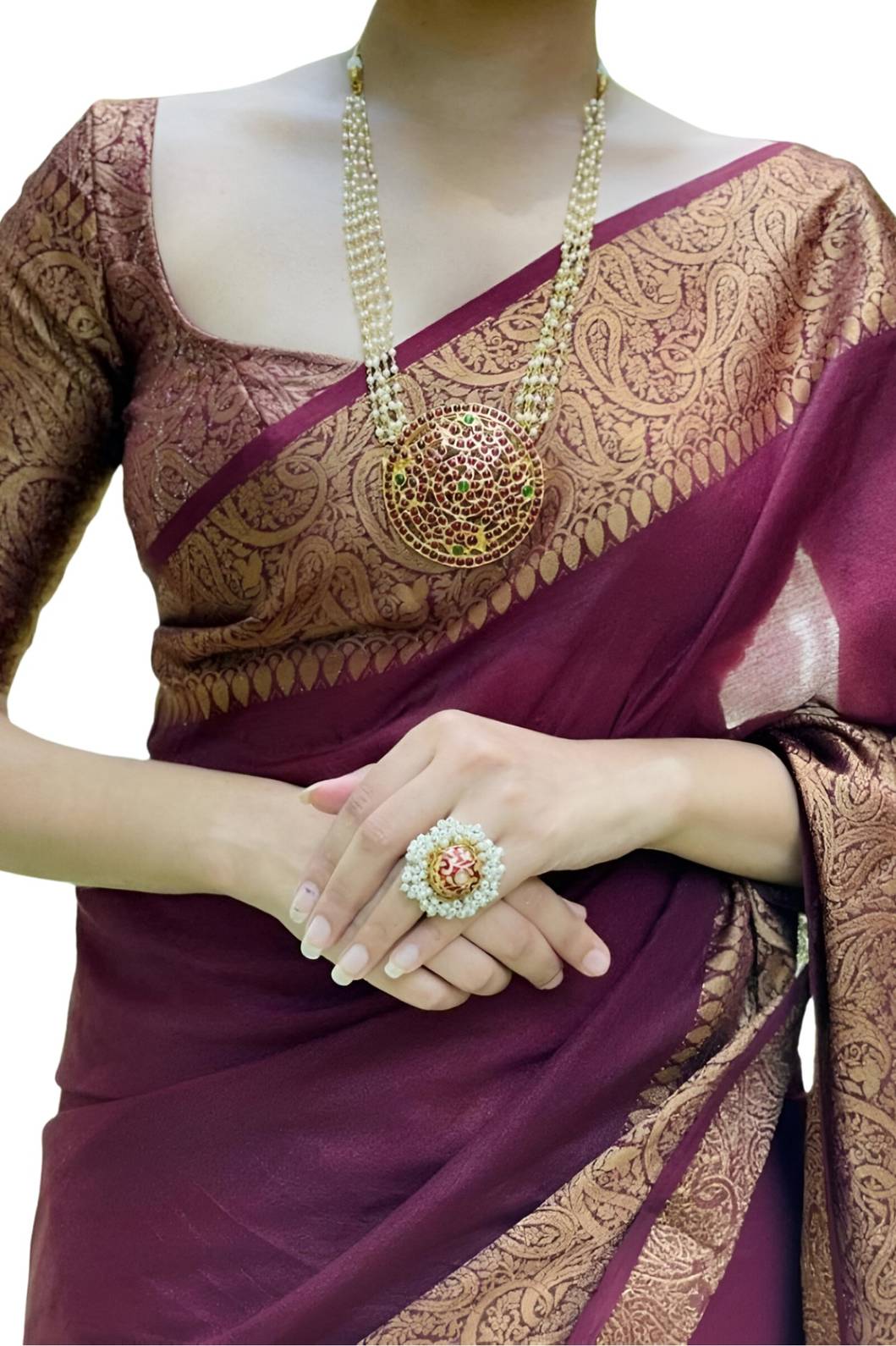 Closeup of fabric showing fine Lichi weave and deep maroon shade – lifestyle background