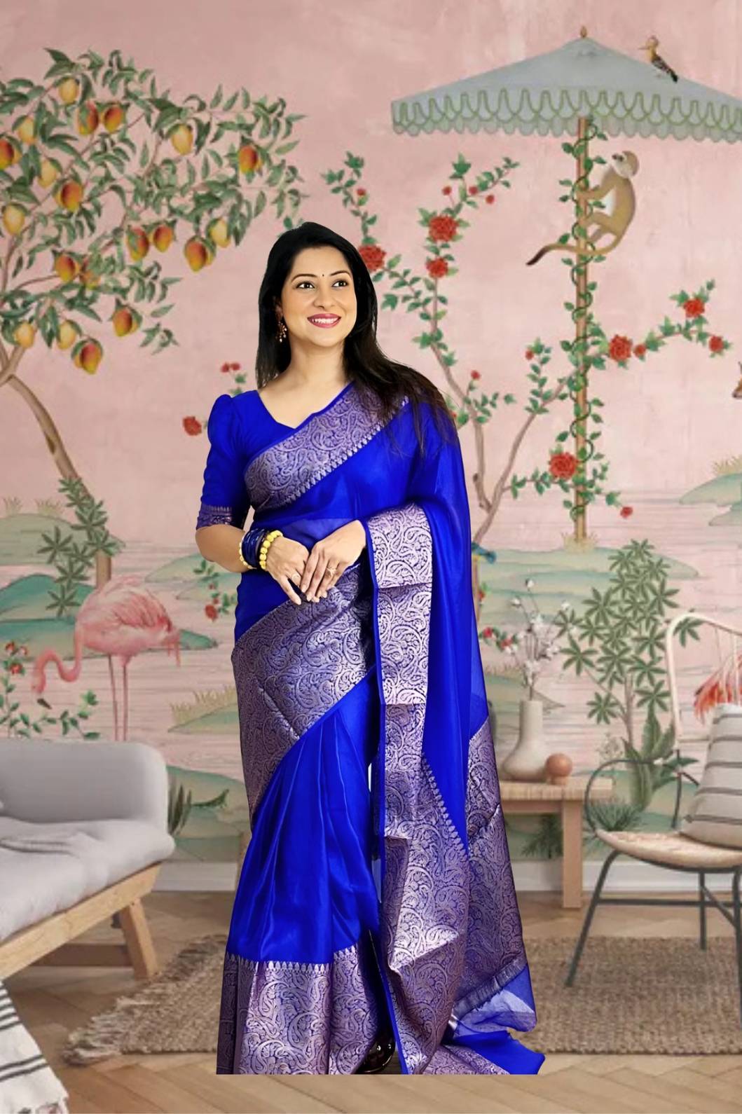Front view of ๐ Ratnavyatha blue silk saree draped fully โ lifestyle background