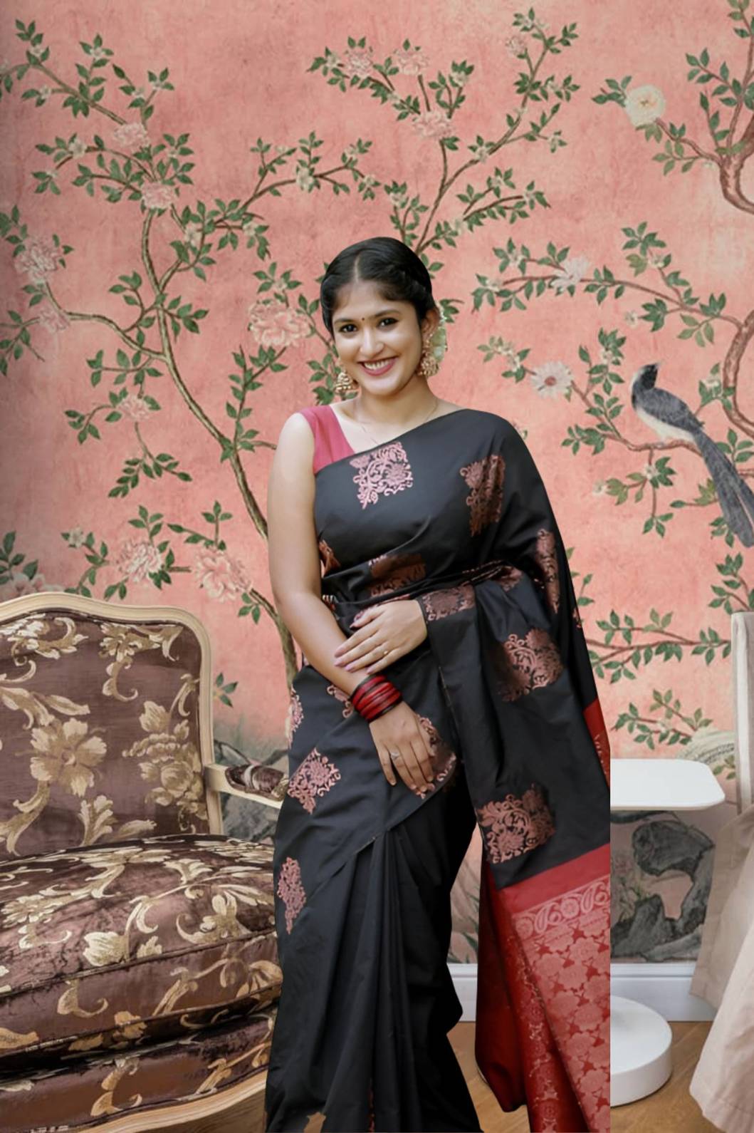 Front view of black-red silk saree in palace setting