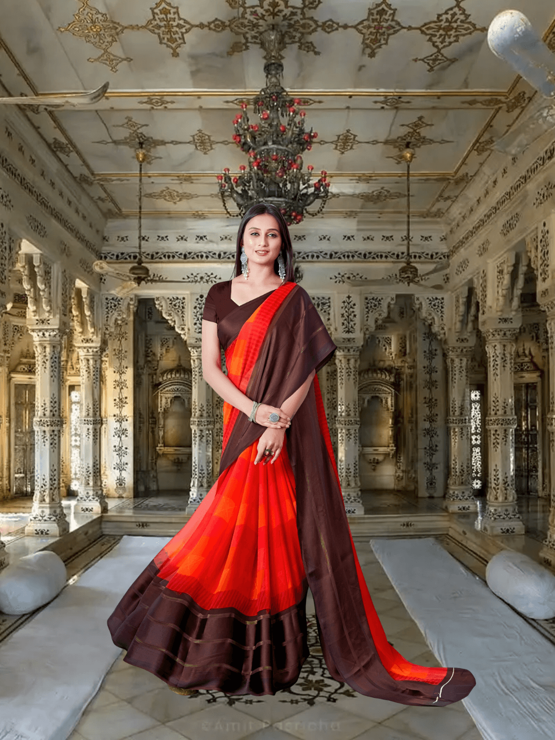 Woman twirling solid red-brown saree