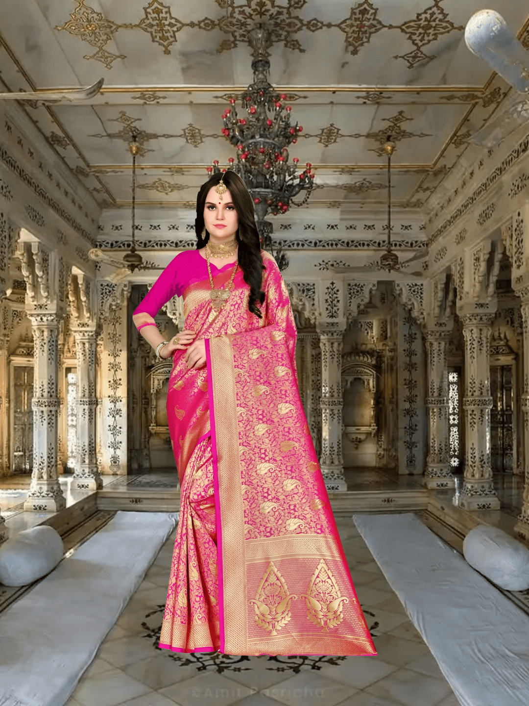 Model in pink Banarasi silk saree with gold motifs inside palace setting