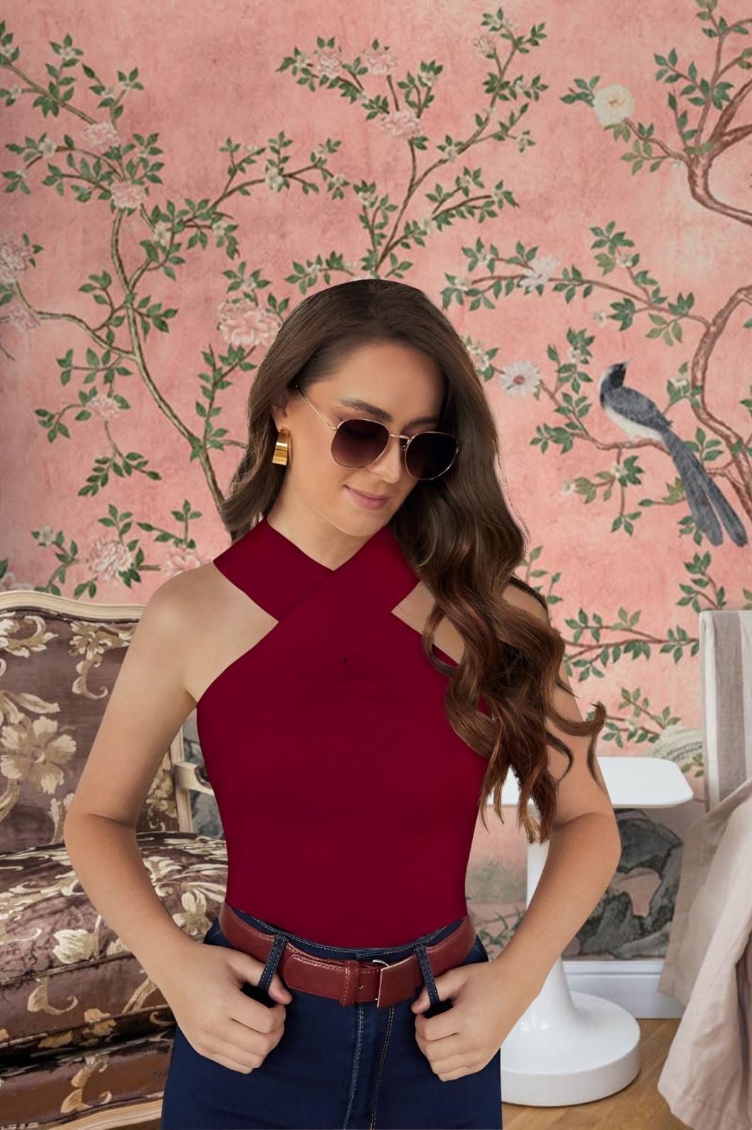 Front view of maroon hosiery T-shirt in elegant setting