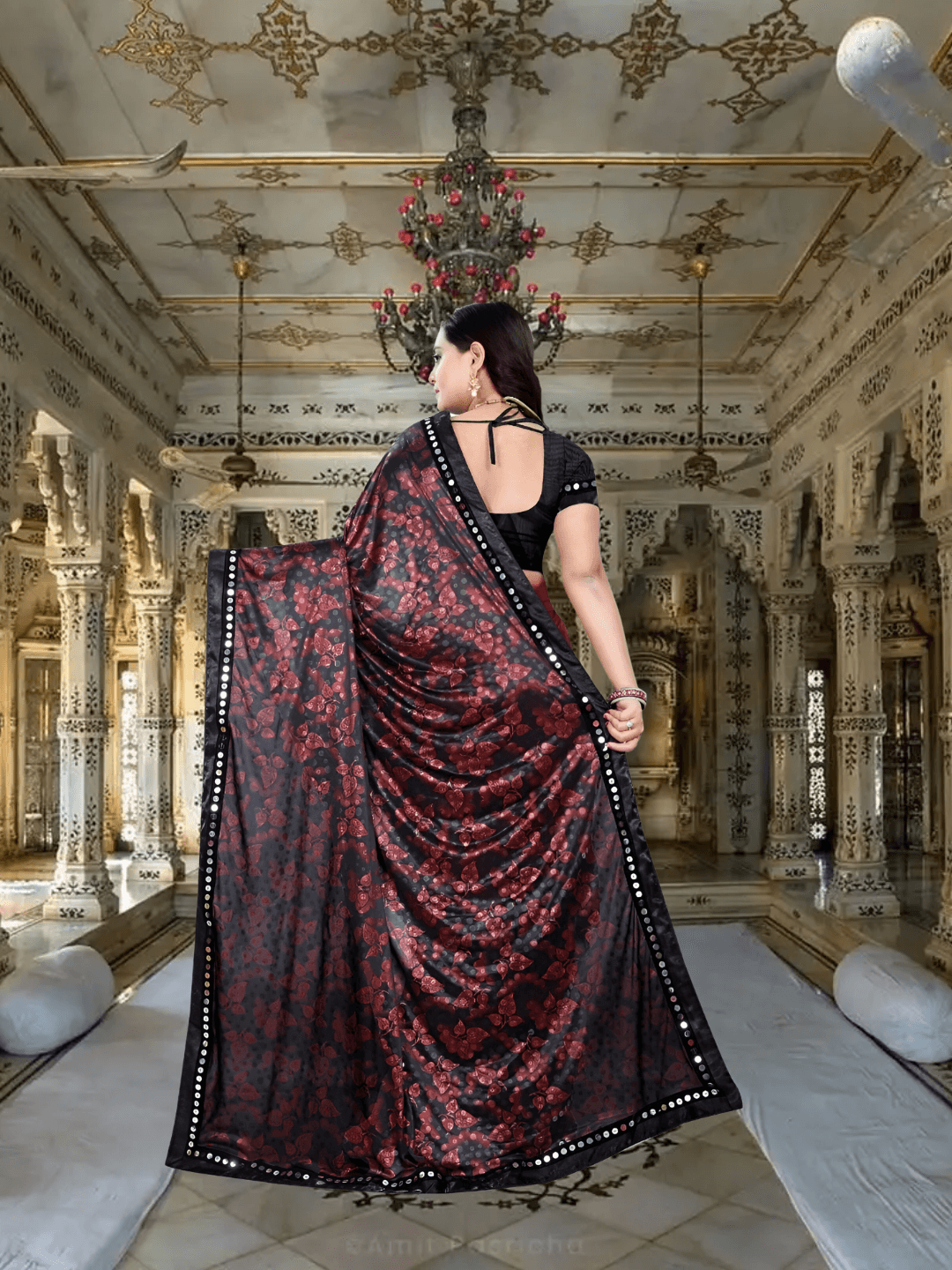 Macro of maroon floral patterns on red-black lycra fabric