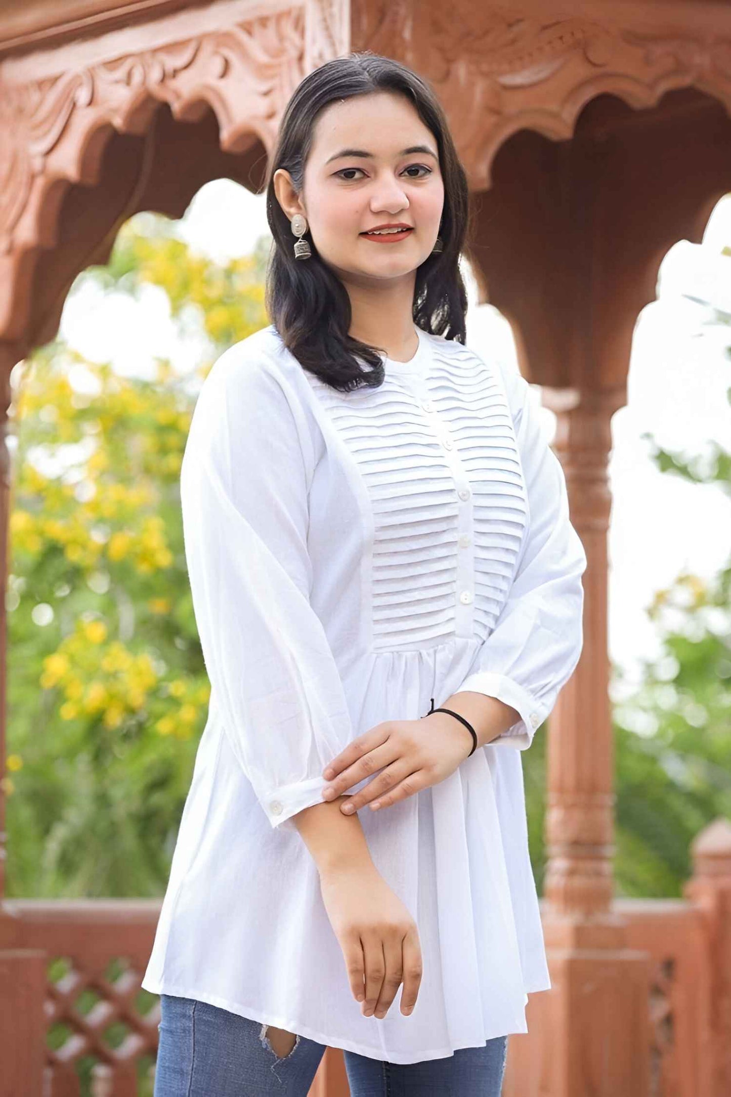 Profile shot capturing full sleeves swallowing wrists, fabric pooling like melted wax