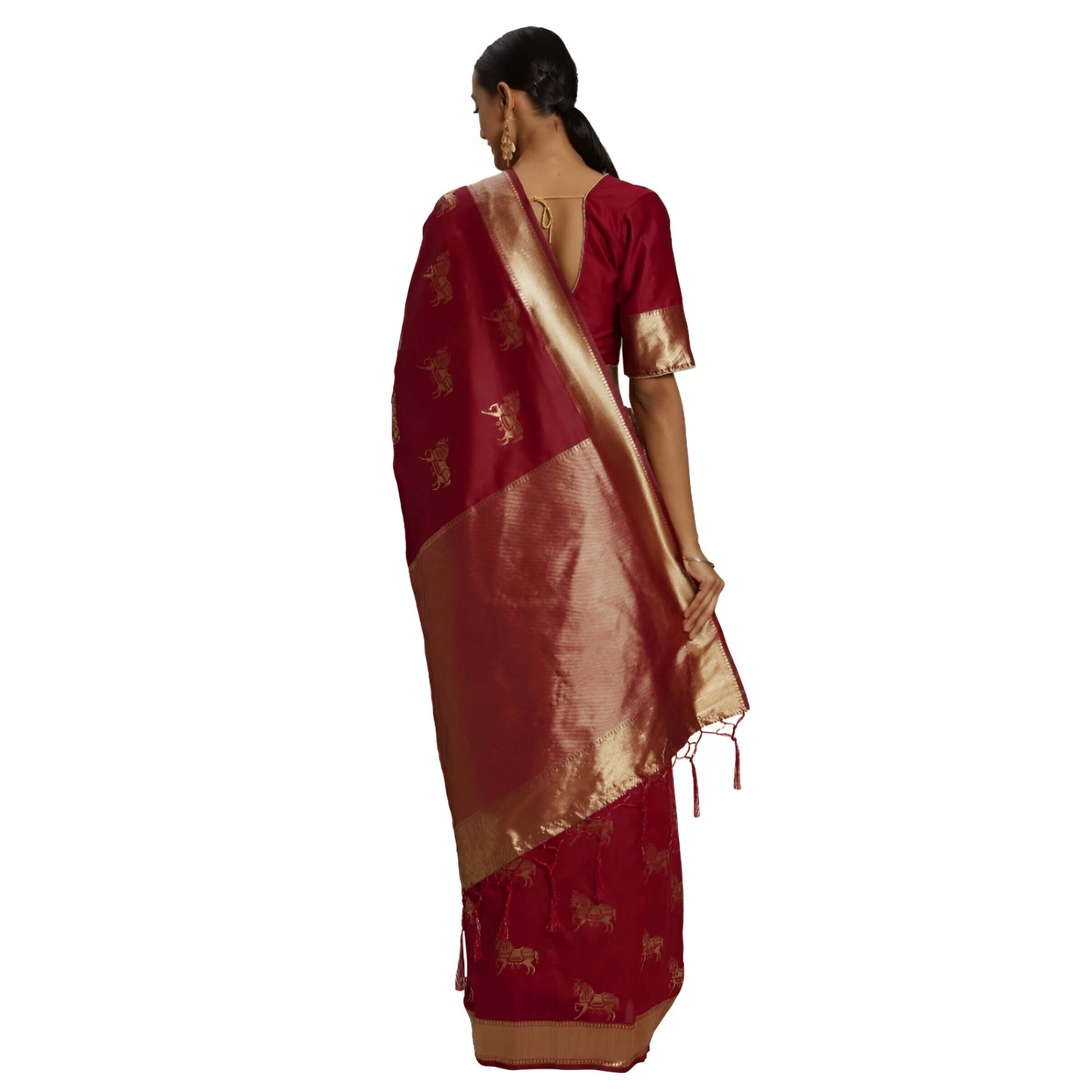 Extended pallu of red saree showing gold temple-inspired patterns in studio