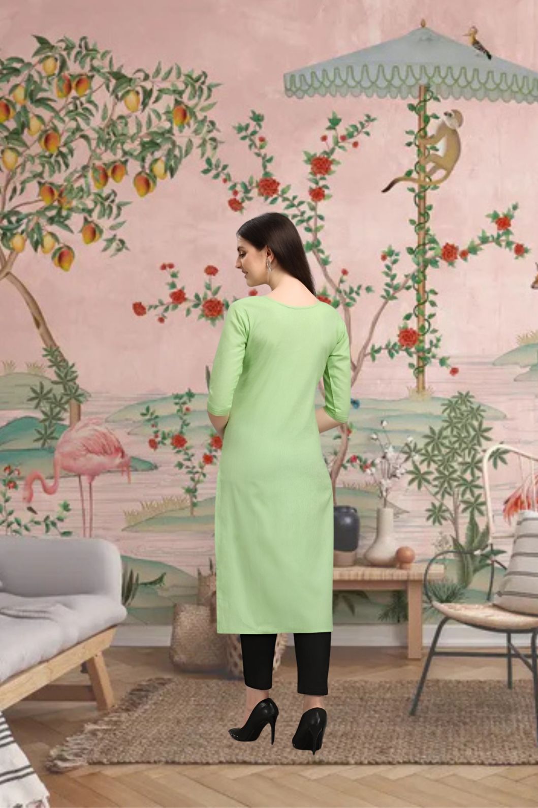 Back view of CELESTINA pista green kurti