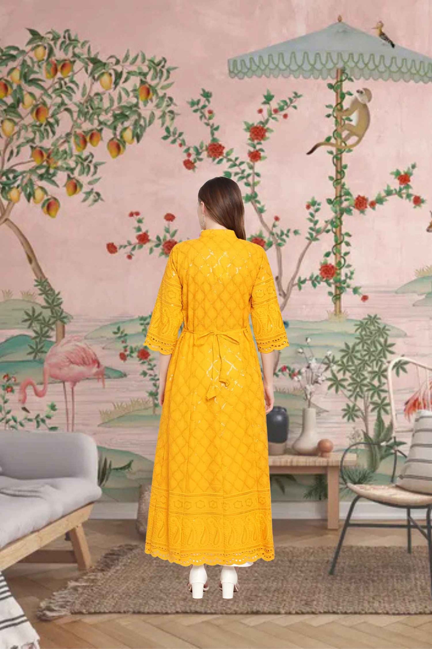 Rear shot showcasing golden thread work