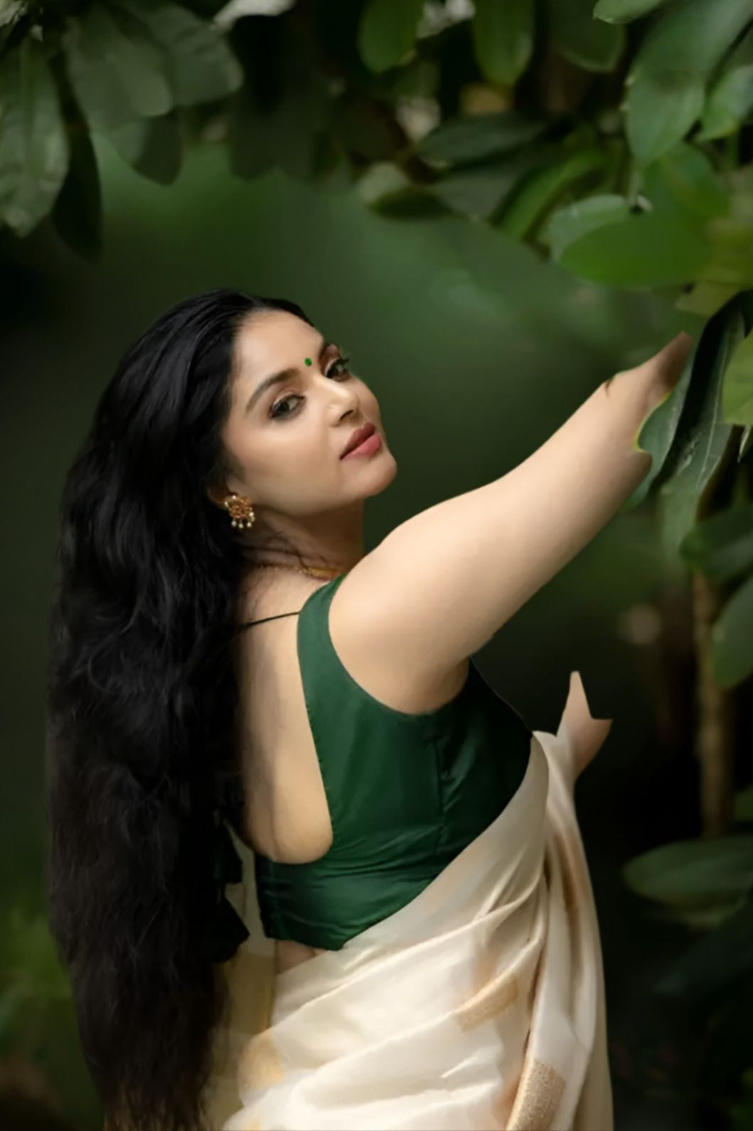 Rear view with smooth pallu fall and soft drape