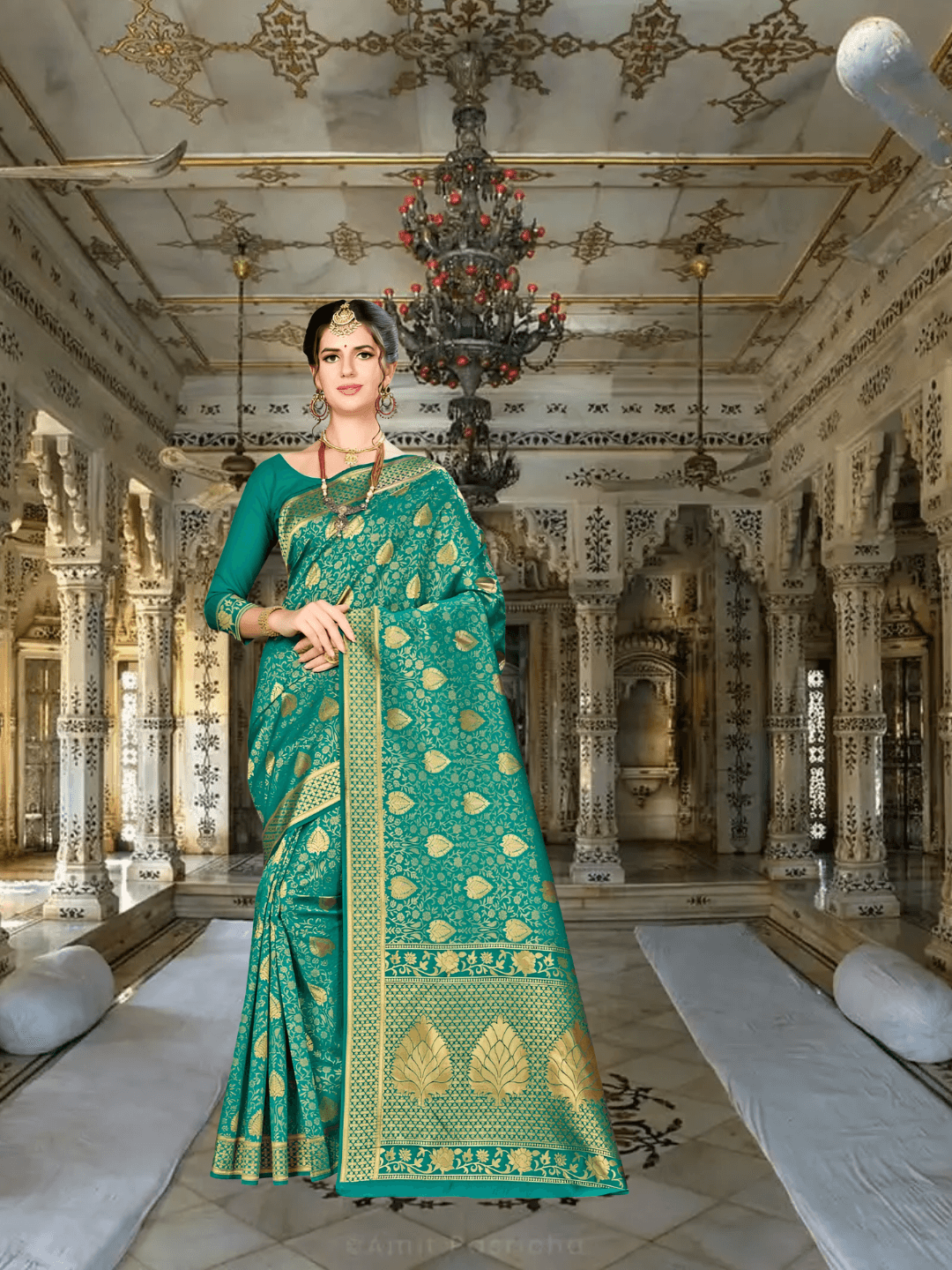 Model in green Banarasi silk saree with golden motifs in palace background